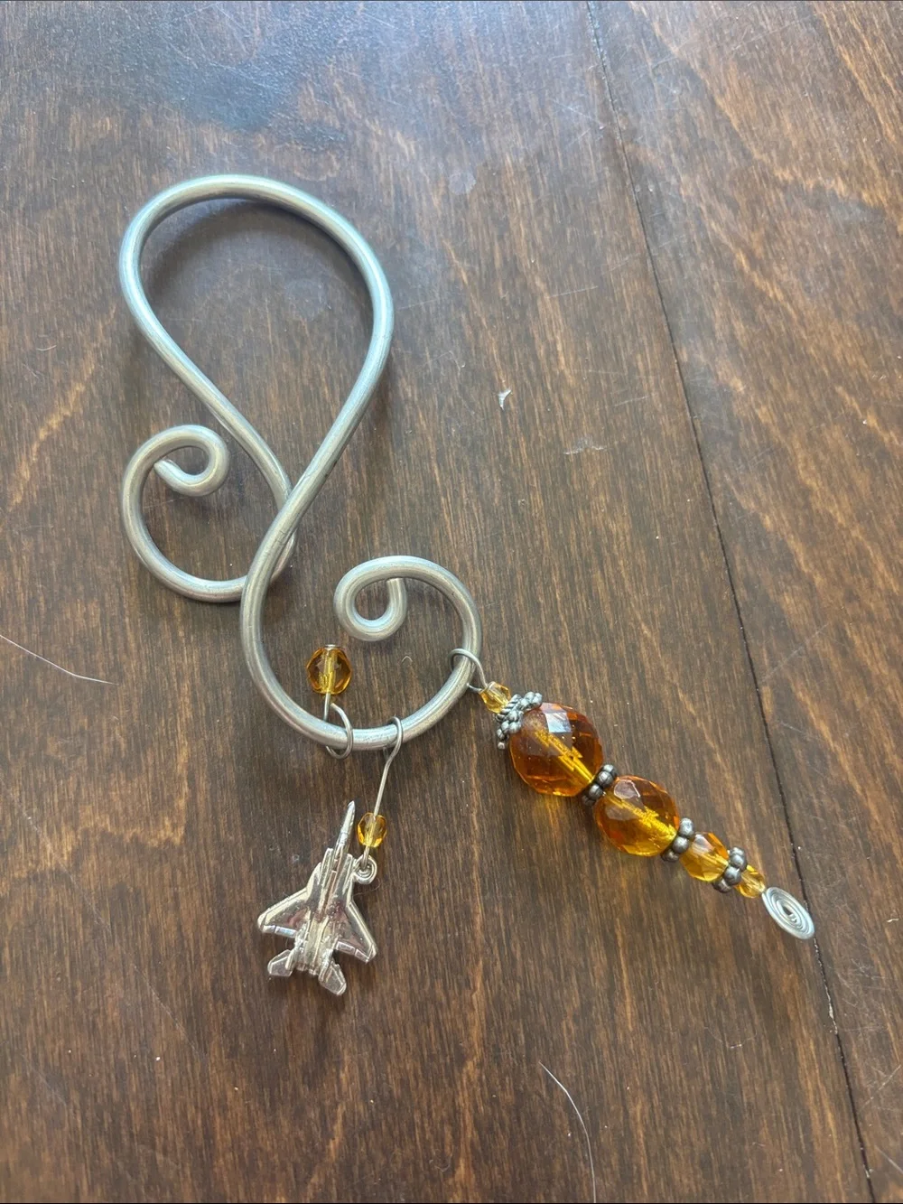 Sporto Silver-Tone Swirl Wine Charm with Amber Beads and Jet Plane